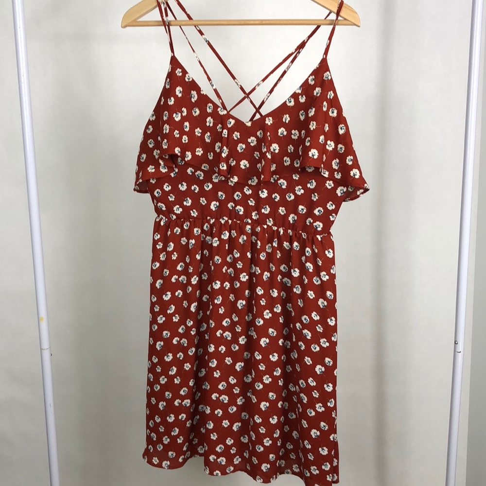 Brand new floral dress with ruffle and zipper back